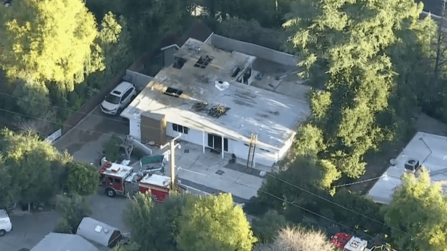 A death investigation takes place following a fire in La Cañada Flintridge on Jan. 30, 2024. (KTLA)