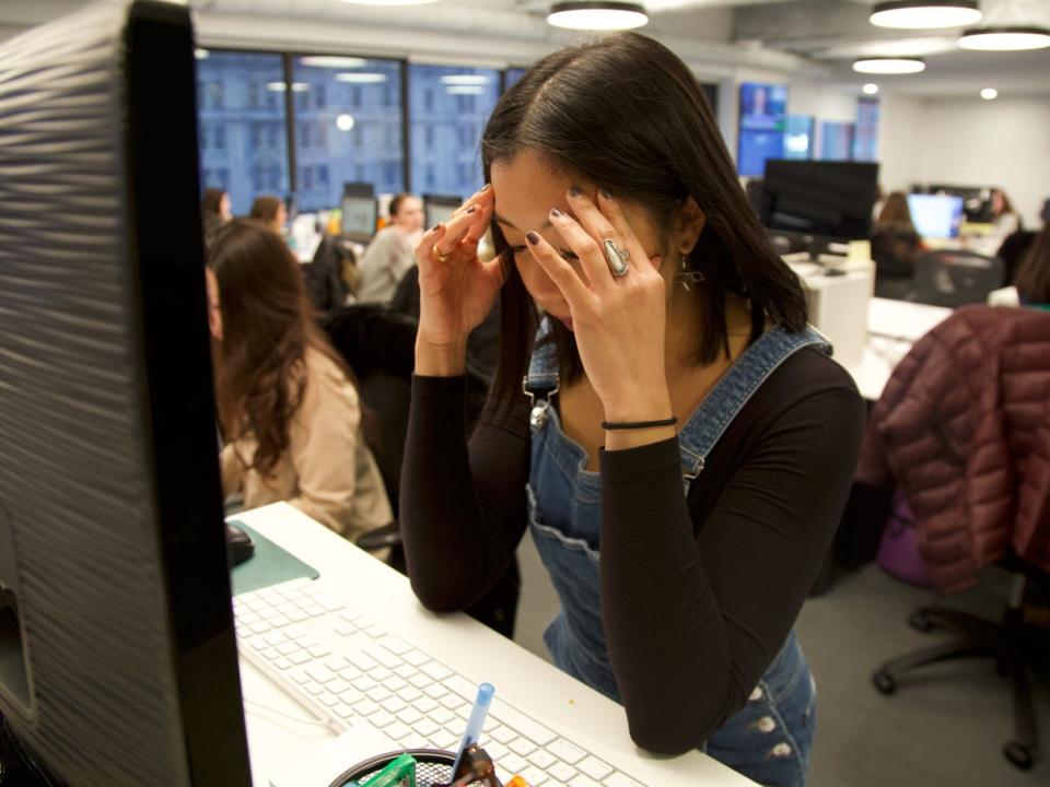 Women with Headache at Office