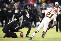 Baltimore Ravens kicker Justin Tucker (9), with Sam Koch holding, kicks a field goal against the Cleveland Browns during the second half of NFL football game, Sunday, Nov. 28, 2021, in Baltimore. The Ravens won 16-10. (AP Photo/Gail Burton)