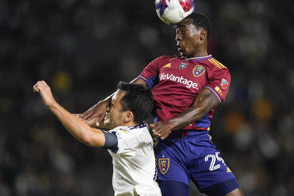 Real Salt Lake midfielder Anderson Julio, right, jumps for the ball against LA Galaxy defender Maya Yoshida during the first half of an MLS soccer match Saturday, Oct. 14, 2023, in Carson, Calif. (AP Photo/Ryan Sun)