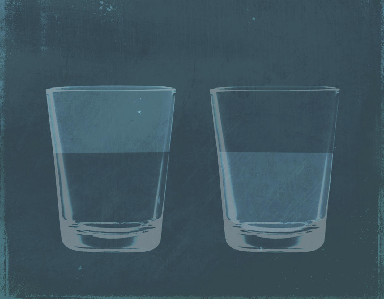  A half full glass of water next to a half empty glass of water. 