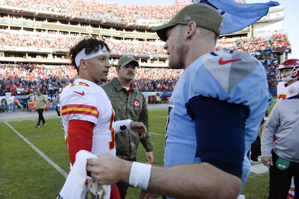 Kansas City Chiefs quarterback Patrick Mahomes (15) congratulates Tennessee Titans quarterback Ryan Tannehill (17) after an NFL football game Sunday, Nov. 10, 2019, in Nashville, Tenn. The Titans won 35-32. (AP Photo/Mark Zaleski)