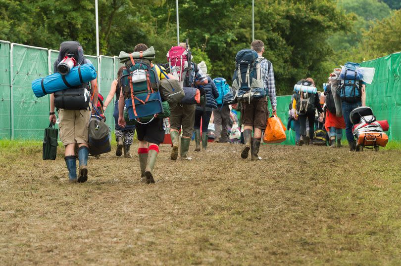 Glastonbury-goers arriving at the festival site to set up camp -Credit:Getty Images