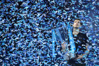 <p>Murray is showered with confetti after winning the 2016 ATP Masters at the 02 Arena. (Getty Images) </p>