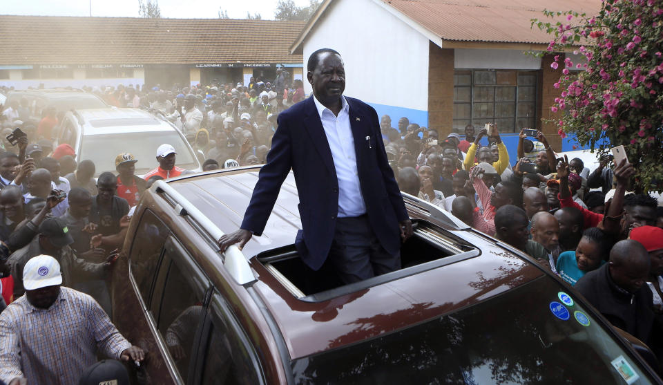 <p>Kenyan Opposition leader Raila Odinga drives passing his supporters after casting his vote in Kibera slums in Nairobi,Kenya, Tuesday, Aug. 8, 2017. (Photo: Noor Khamis/AP) </p>