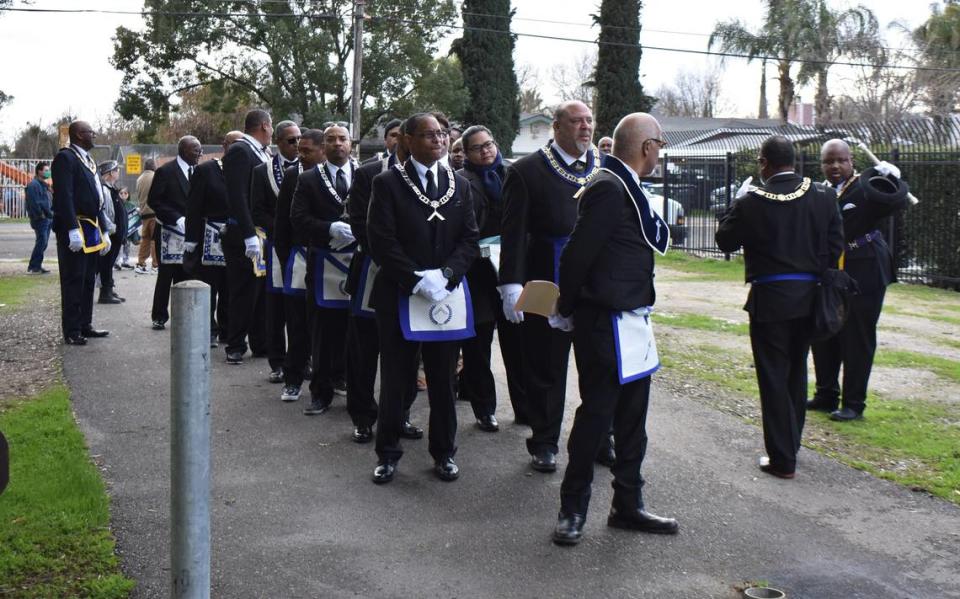 Masonic Lodge members and others assemble for the MLK Unity March on Monday afternoon, Jan. 16, 2023, on the Helen White Trail in Modesto.
