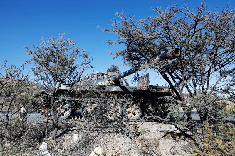 FILE PHOTO: A damaged Eritrean military tank is seen near the town of Wikro