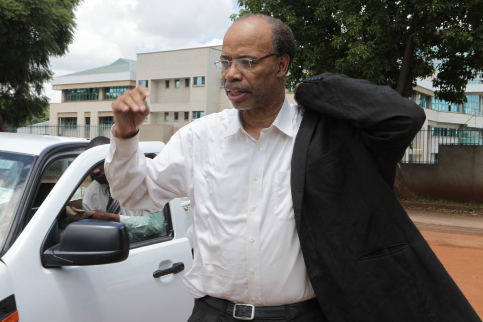 Former U S Congressman, Mel Reynolds, arrives to appear at the magistrates courts in Harare, Wednesday, February, 19, 2014. Reynolds was arrested in Zimbabwe for allegedly possessing pornographic material and violating immigration laws. (AP Photo/Tsvangirayi Mukwazhi)