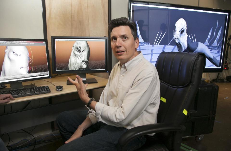 This June 8, 2012 photo shows Visual Effects VFX Supervisor and owner, Andrew Orloff, working on a Motion Analysis, 3-D Passive Optical Motion Capture session for the upcoming "Falling Skies" TV show, at Zoic Studios, in Los Angeles. The art and craft of special effects can make viewers believe that alien invaders walk among us on "Falling Skies" or add the Atlantic City shoreline to a New York set for "Boardwalk Empire." The TV academy has transformed its visual effects honors this year with two new awards. Category 89 recognizes shows with magic at their core, such as the sci-fi saga "Falling Skies." Category 90, the other newcomer, is for imagery that plays a supporting role in a program not dependent on "special visual effects to tell the story," according to academy guidelines. (AP Photo/Damian Dovarganes)