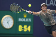 Adam Walton, of Australia, plays a ball in his men's first round match against Felix Auger-Aliassime, of Canada, at the Miami Open tennis tournament, Thursday, March 21, 2024, in Miami Gardens, Fla. (AP Photo/Rebecca Blackwell)