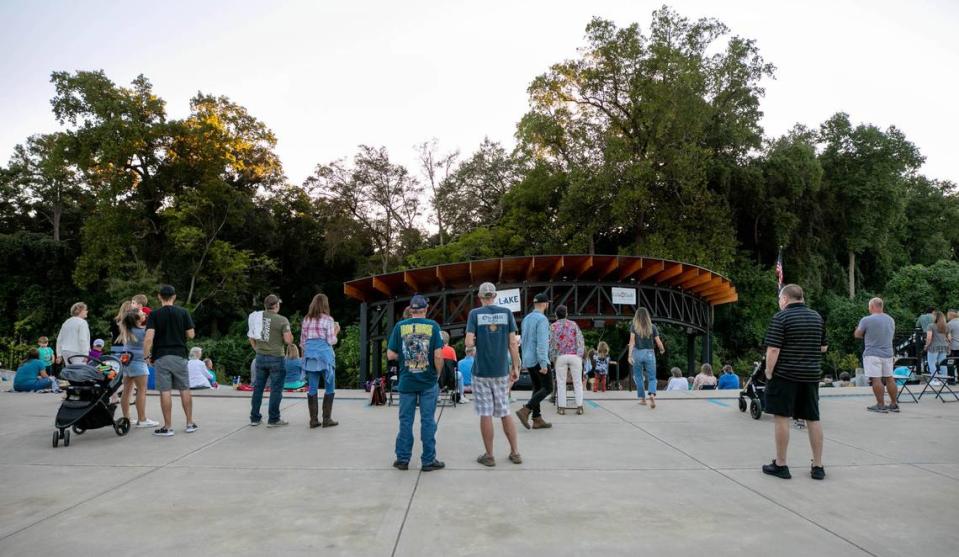 People gather at the Icehouse Amphitheater for a night of music in Lexington.