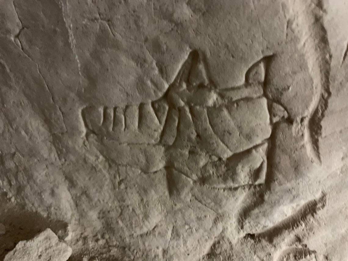 Another carving on the cave wall.