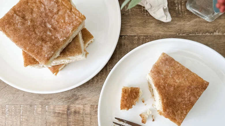 Sopapilla cheesecake on white plate