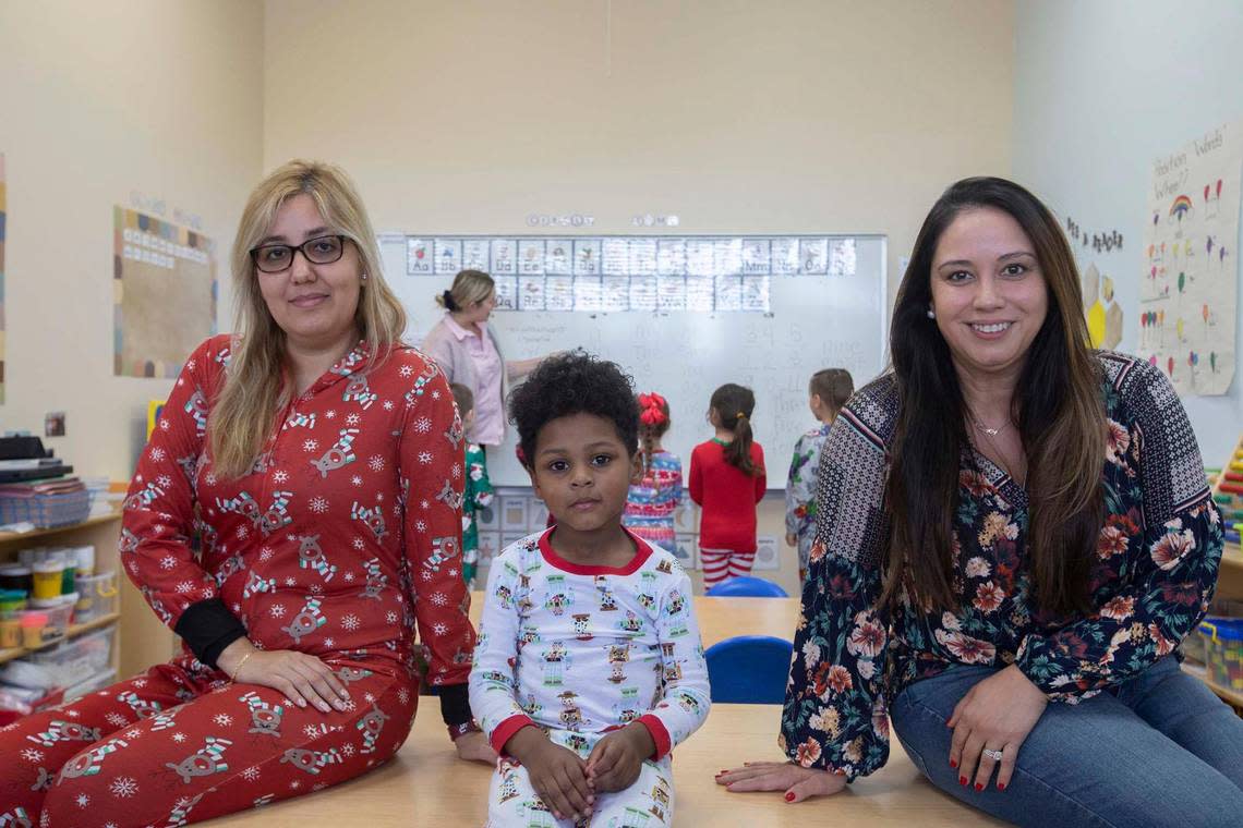 From left, Lorena Gamboa, director, Mason De Paz, and Lety Carvajal, CEO/Founder of Springview Academy of Hialeah on Friday, Dec. 24th., 2022. Behind them is Ashley Correa, admissions director at Springview Academy of Hialeah.