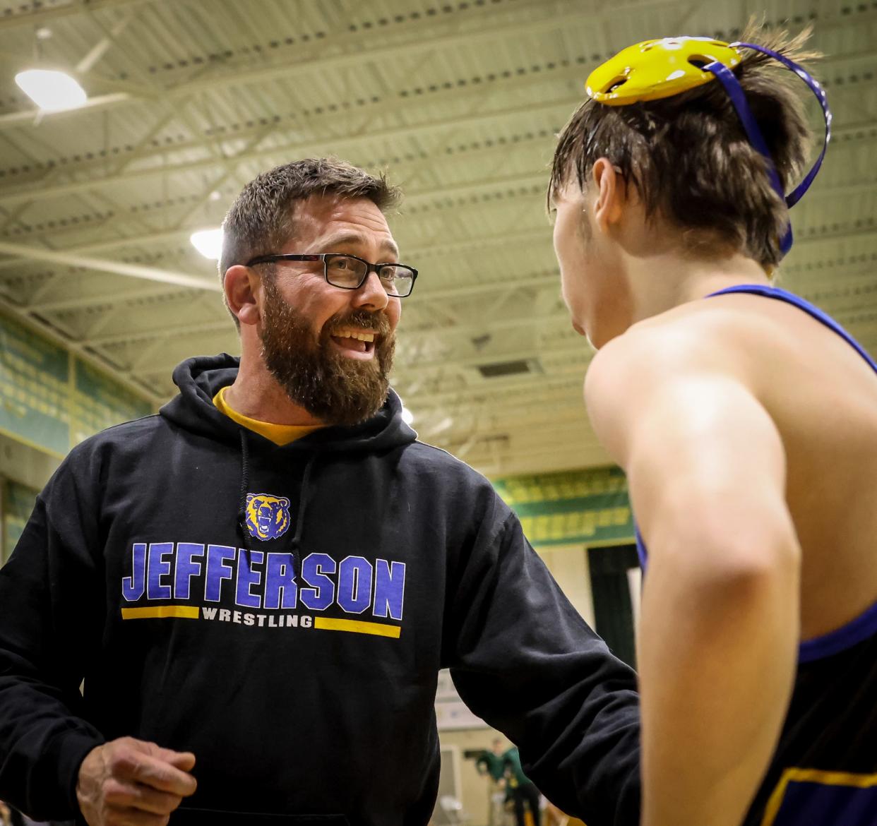 Jefferson's Coach Ryan Nadeau talks to Daniel Allen after his match against Riverview Wednesday.