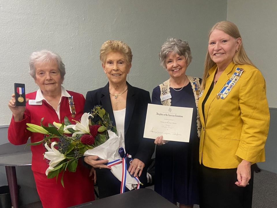 The Elizabeth Schuyler Hamilton Chapter presented the DAR's Women in America History Award to Lupita Reyes (center left) on Thursday, Oct. 12.