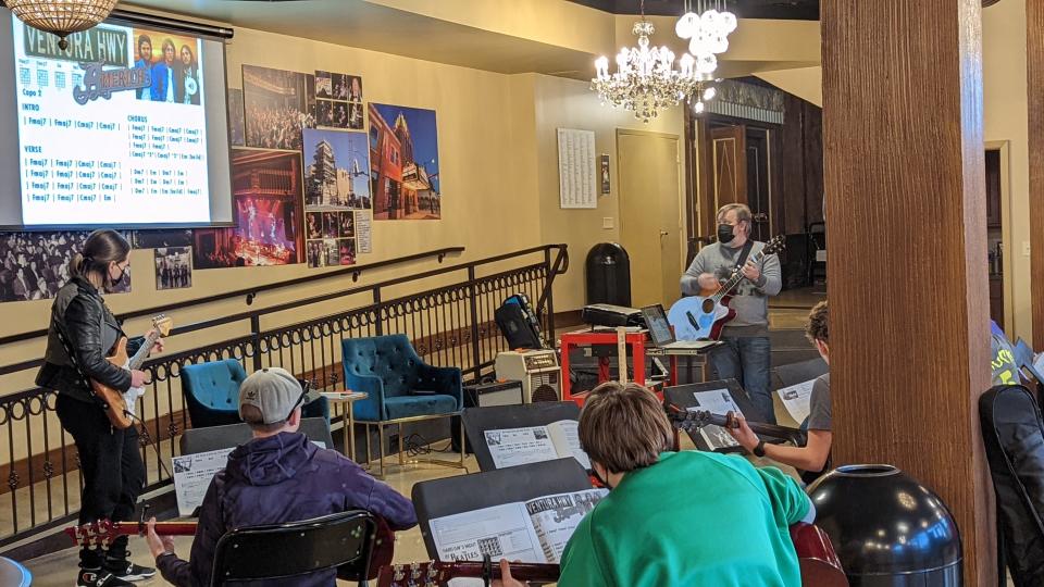 The Intermediate Guitar Class of the Mike Finnigan School of Music at Stiefel Theatre works on the song "Ventura Highway" by America. The song is one that will be performed next week at the recital that marks the end of the eight-week course of this first round of classes for the school.