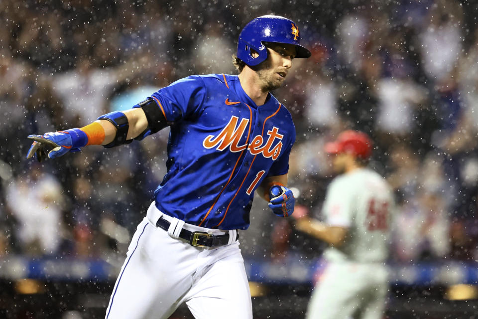 New York Mets' Jeff McNeil runs the bases after hitting a three-run home run against the Philadelphia Phillies during the fourth inning of a baseball game Saturday, May 28, 2022, in New York. (AP Photo/Jessie Alcheh)