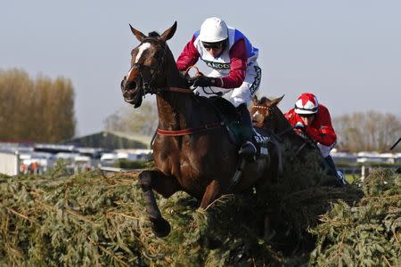 Britain Horse Racing - Grand National Festival - Aintree Racecourse - 8/4/17 Derek Fox on One For Arthur in action during the 5:15 Randox Health Grand National Reuters / Phil Noble Livepic