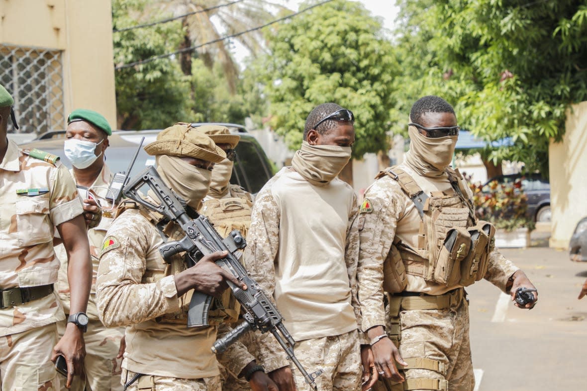 FILE PHOTO – President of the CNSP and head of Malian special forces arrives at the transitional talks with ECOWAS on August 24, 2020 in Bamako, Mali. (Photo by John Kalapo/Getty Images)