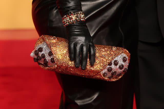 <p>Christopher Polk/Variety via Getty</p> Melissa McCarthy's cannoli bag at 2024 Vanity Fair Oscar Party