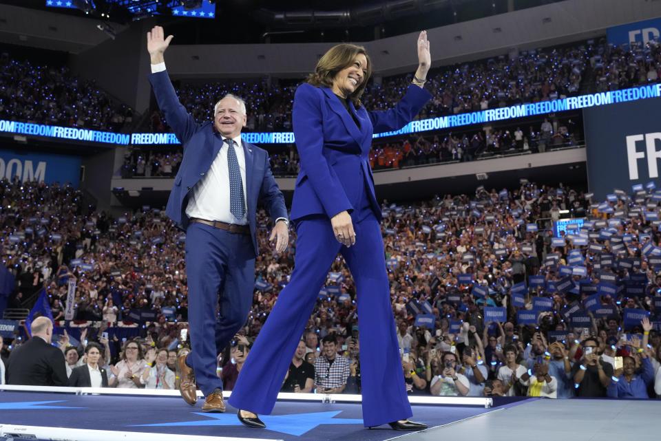 Democratic presidential nominee Vice President Kamala Harris and running mate Minnesota Gov. Tim Walz appear at the Fiserv Forum during a campaign rally in Milwaukee, Tuesday, Aug. 20, 2024. (AP Photo/Jacquelyn Martin)