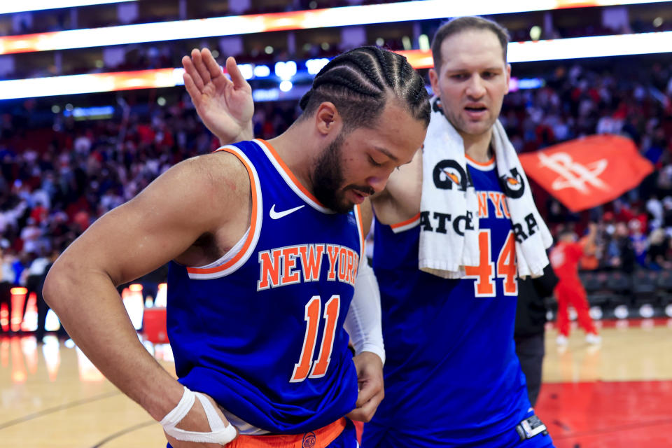 HOUSTON, TEXAS - FEBRUARY 12: Jalen Brunson #11 of the New York Knicks and Charlie Brown Jr. #44 walk off the court after losing to the Houston Rockets 105-103 at Toyota Center on February 12, 2024 in Houston, Texas. NOTE TO USER: User expressly acknowledges and agrees that, by downloading and or using this photograph, User is consenting to the terms and conditions of the Getty Images License Agreement. (Photo by Carmen Mandato/Getty Images)
