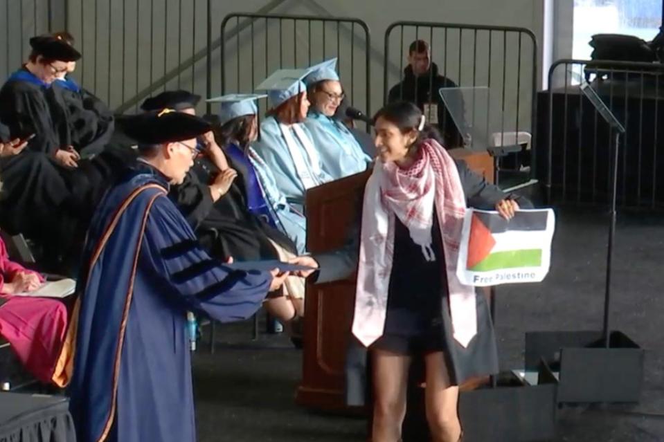 A keffiyeh-clad Veda Kamra clutched a “Free Palestine” sign as she accepted her diploma. Columbia University