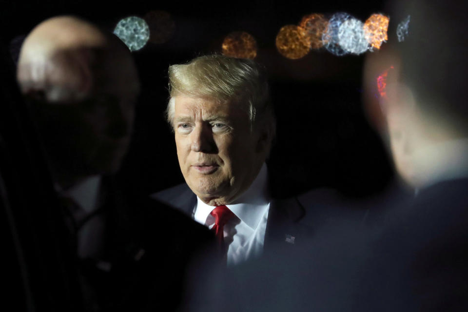 FILE PHOTO: U.S. President Donald Trump arrives aboard Air Force One to rally with supporters in Chattanooga