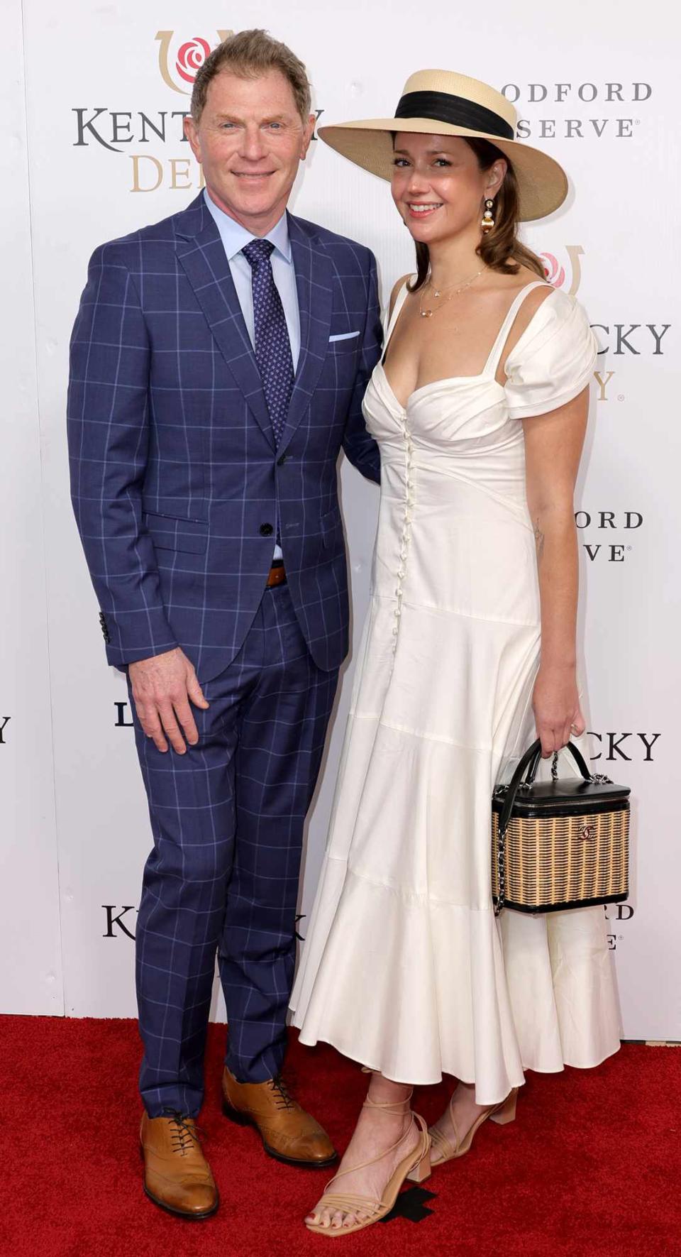 Bobby Flay and Christina Pérez attend the 148th Kentucky Derby at Churchill Downs on May 07, 2022 in Louisville, Kentucky