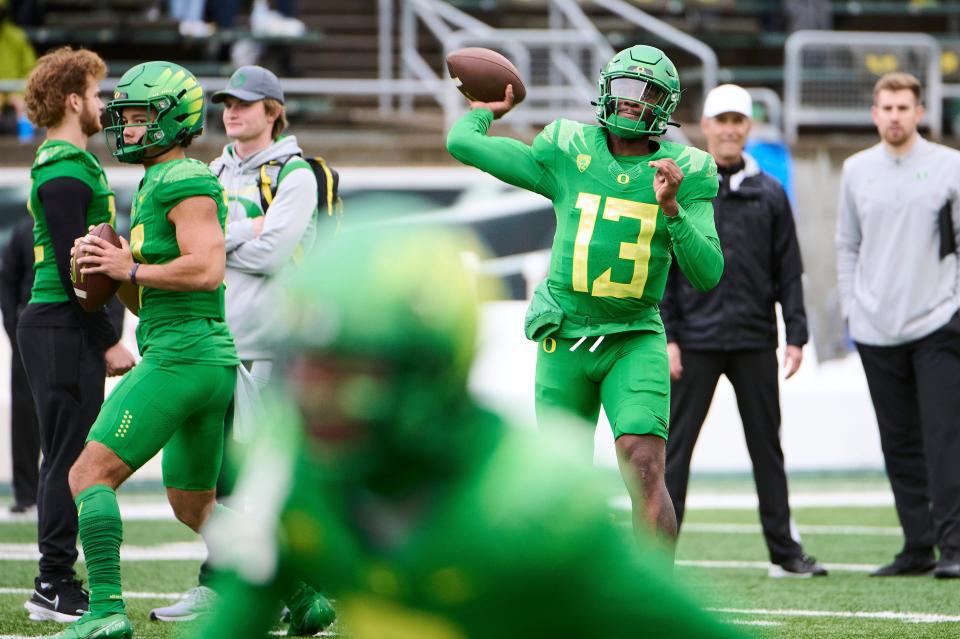 Nov 27, 2021; Eugene, Oregon, USA; Oregon Ducks quarterback Anthony Brown (13) throws the football before a game against the Oregon State Beavers at Autzen Stadium. Mandatory Credit: Troy Wayrynen-USA TODAY Sports