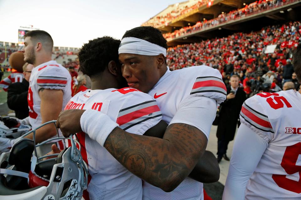 Dwayne Haskins and Parris Campbell shared a hug after they led Ohio State to a comeback victory over Maryland, 52-51 in overtime in 2018.