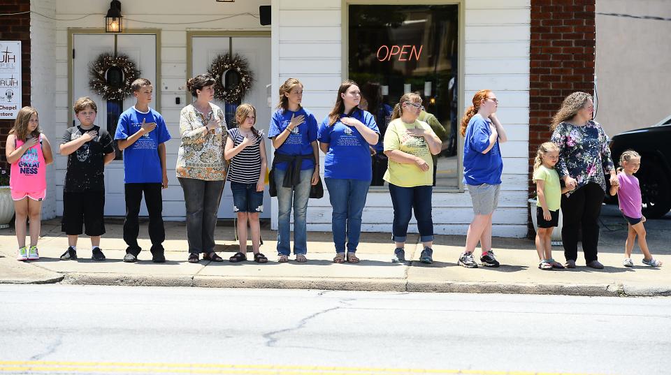 Truth Chapel youth campers paid respect to Spartanburg County deputy Aldridge during procession.