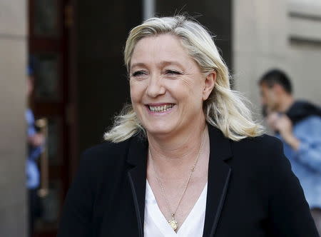 Marine Le Pen, the leader of France's far-right National Front party, walks after leaving the building of the State Duma, the lower house of parliament, in central Moscow, Russia, May 26, 2015. REUTERS/Maxim Zmeyev