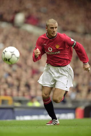 <p>Shaun Botterill /Allsport</p> David Beckham of Manchester United in action during the FA Carling Premiership match against Leeds United at Old Trafford in Manchester, England.