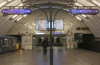 The entrance of the Sadovaya subway station is closed by a police cordon after an explosion in St. Petersburg, Russia, Monday, April 3, 2017. The subway in the Russian city of St. Petersburg is reporting that there are fatalities and several people have been injured in an explosion on a subway train. (AP Photo/Yevgeny Kurskov)