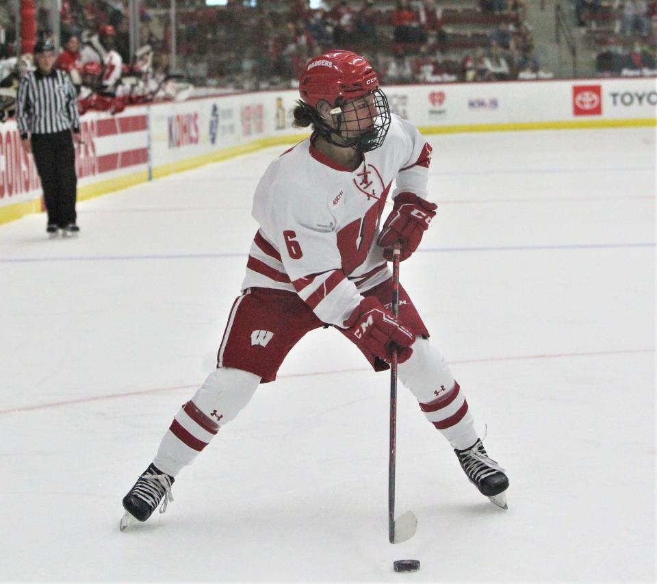 Wisconsin's Lacey Eden control the puck during the team's 6-0 win over Lindenwood on Thursday Sept. 29, 2022 at LaBahn Arena in Madison, Wis.