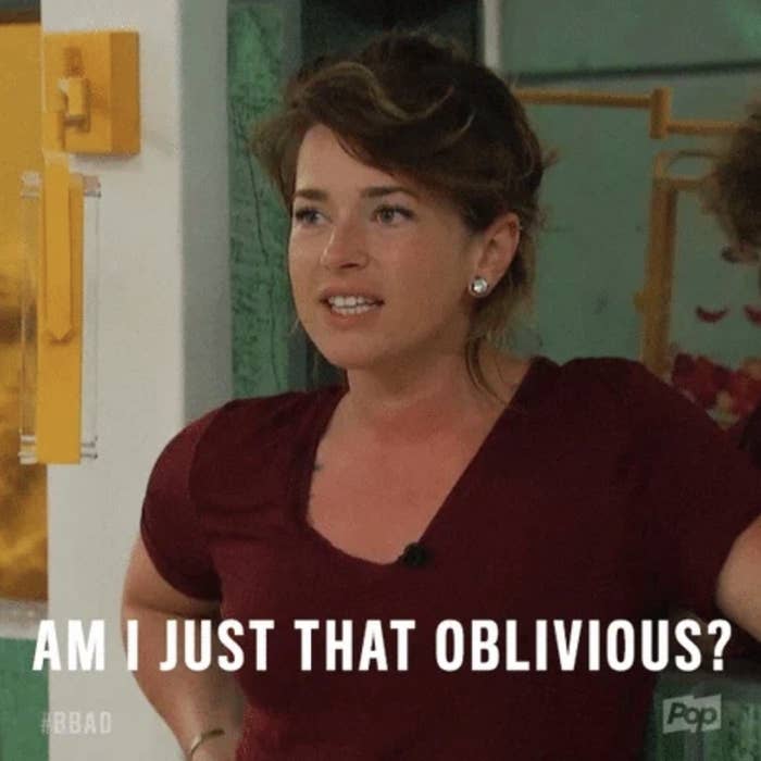 The image shows a woman in a relaxed at-home setting with text overlayed that reads, "Am I just that oblivious?" #BBAD