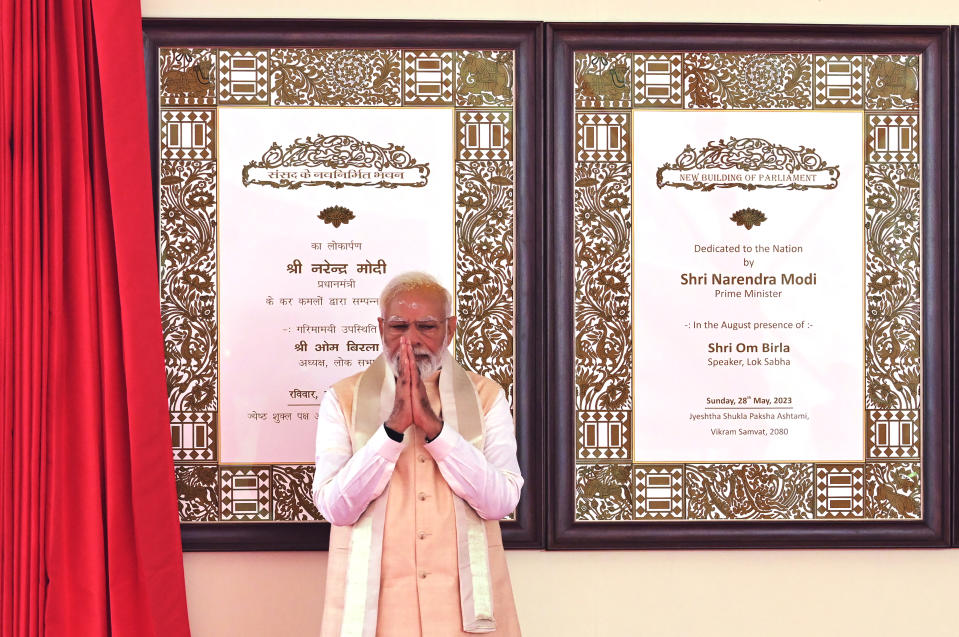 Indian prime minister Narendra Modi greets after inaugurating the new parliament building in New Delhi, India, Sunday, 28 May 2023. The new triangular parliament building, built at an estimated cost of $120 million, is part of a $2.8 billion revamp of British-era offices and residences in central New Delhi called "Central Vista", as India's major opposition parties boycotted the inauguration of a new parliament building Modi, in a rare show of unity against the Hindu nationalist ruling party that has completed nine years in power and is seeking a third term in crucial general elections next year. (AP Photo)