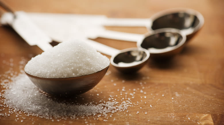 Spoon with granulated sugar