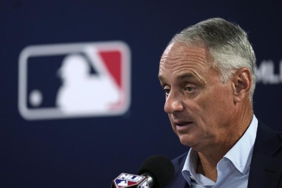 Major League Baseball commissioner Rob Manfred speaks during a baseball spring training.