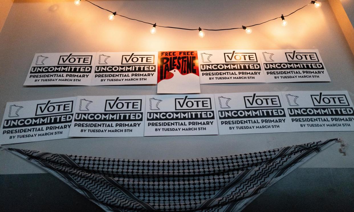 <span>Placards adorn a wall at an Uncommitted Minnesota watch party during the presidential primary in Minneapolis, Minnesota on Super Tuesday.</span><span>Photograph: Stephen Maturen/AFP/Getty Images</span>