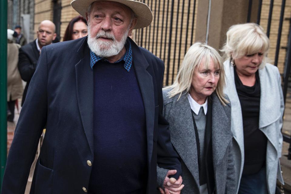 Reeva Steenkamp father Barry (L) and mother June (C) arrive at the Pretoria High Court for the sentencing hearing set to send South African Paralympian Oscar Pistorius back to jail for murdering his girlfriend Reeva Steenkamp three years ago, in Pretoria on June 13, 2016.