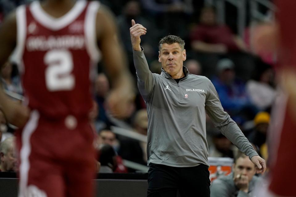 OU coach Porter Moser motions to his players during the first half against Baylor in the Big 12 quarterfinals on March 10 in Kansas City, Mo.