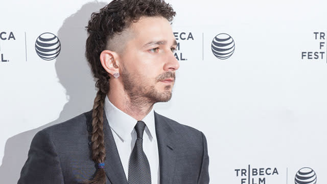 It's on you, Shia LaBeouf!! Stay very, very still. The 28-year-old actor hit the Tribeca Film Festival red carpet sporting a braided ponytail that looks a little like a hogtied mullet. Getty Images <strong>Who did this to you?</strong> NEWS: Which Celebrity Hair Extension Line Is Right for You? Of course, this is not the first we've seen of Shia's braided rattail, but it appears, in the time since it's debut -- for what we desperately hope it is a movie role -- it has grown, changed. We dare say it's taken on a life of it's own. PHOTO: Shia LaBeouf's New Look Includes a Braided Rattail and an Eyebrow Piercing Soon, the organism could outgrow its host. Be careful, Shia!! And if Shia LaBeouf is just looking for a bold, new look, perhaps we can suggest a few celebrity hair extension lines from Kylie Jenner, Demi Lovato and more. Watch the video below.