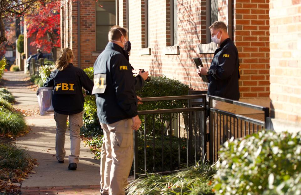 FBI agents remove items from the German Village home of Public Utilities Commission of Ohio Chairman Sam Randazzo in Columbus, Ohio on November 16, 2020. 