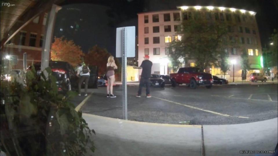 Security camera footage at a downtown Boise retail store captured three individuals, identified as Payton Wasson, left, Jordan Smith, middle, and Mario Garza, at Garza’s black Kia sedan in the 5th Street strip mall in the early morning hours of June 24. A Boise police officer shot Wasson just moments later.