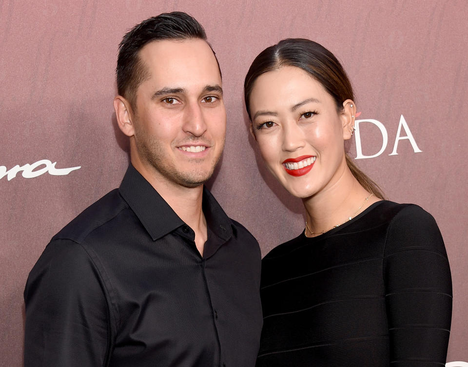 LOS ANGELES, CA - JULY 18:  Michelle Wie and Jonnie West arrive at the Sports Illustrated Fashionable 50 at The Sunset Room on July 18, 2019 in Los Angeles, California.  (Photo by Gregg DeGuire/FilmMagic)