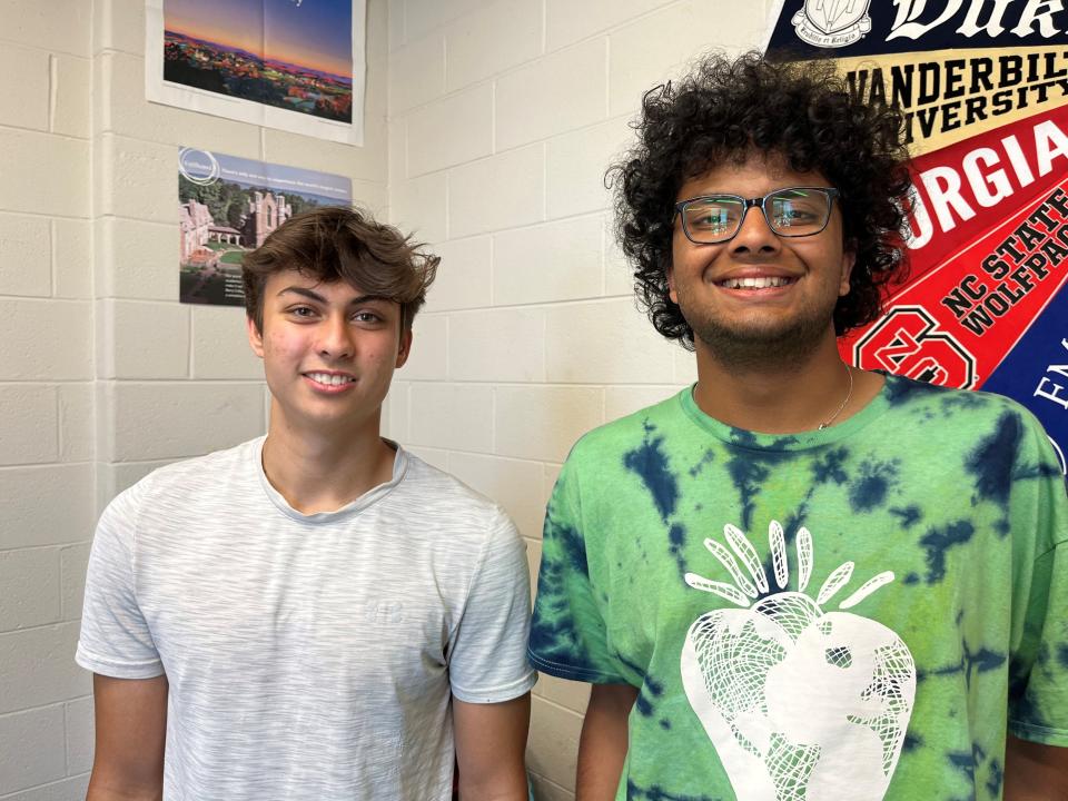 Oliver Hemmelgarn, left, and Ayaz Sultan, who were recently named co-valedictorians for the Class of 2023 at West High School, are shown at the school on May 19.