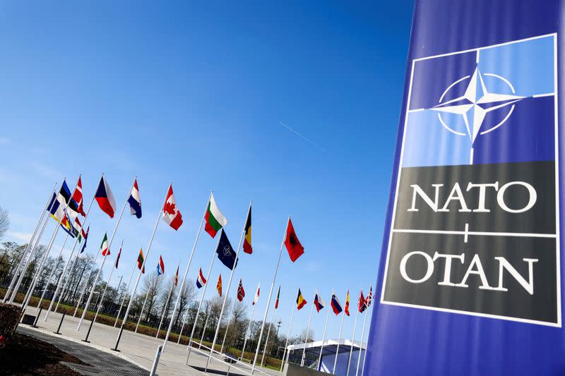 FILE PHOTO: Flags flutter at the NATO headquarters in Brussels